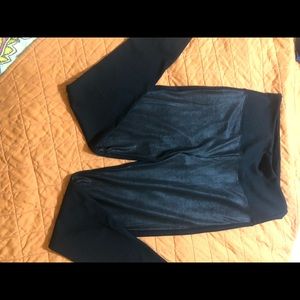 Leggings with sheen on front.